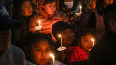 A community vigil for shootings earlier in the week in Half Moon Bay, Calif., Jan. 27, 2023.