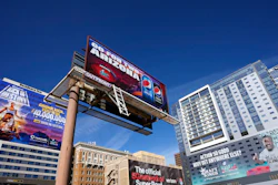 Advertisements adorn buildings and electronic billboards leading up to Super Bowl LVII in Phoenix, Feb. 3, 2023.