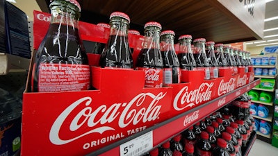 Bottles of Coca-Cola at a market in Uniontown, Pa., April 24, 2022.
