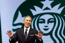 Starbucks CEO Howard Schultz speaks at the Starbucks annual shareholders meeting in Seattle.
