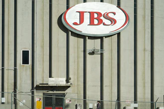 A worker heads into the JBS meatpacking plant in Greeley, Colo., on Oct. 12, 2020.