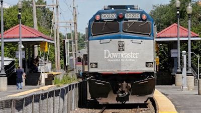 Amtrak's Downeaster train pulls out of the station in Haverhill, Mass., July 10, 2012.