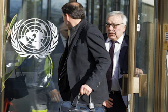 Russia's Deputy Foreign Minister Sergei Vershinin, right, leaves the European headquarters of the United Nations in Geneva, Switzerland, March 13, 2023.