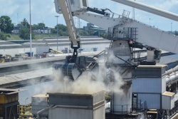 Grain is offloaded from the Eaubonne bulk carrier at the port of Mombasa, Kenya, Nov. 26, 2022.