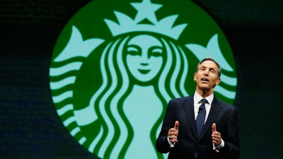 Howard Schultz, chairman and CEO of Starbucks Coffee Company, at the company's annual shareholders meeting, Seattle, March 19, 2014.