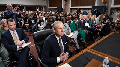 Longtime Starbucks CEO Howard Schultz testifies before a Senate committee at the Capitol, March 29, 2023.