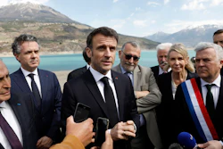 French President Emmanuel Macron speaks to journalists in Sainte-Savine-Le-Lac, France, March 30, 2023.