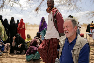 World Food Program Chief David Beasley meets with villagers in Wagalla, Kenya, Aug. 19, 2022.