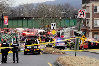 Emergency personnel at the site of a deadly explosion at a chocolate factory in West Reading, Pa., March 25, 2023.