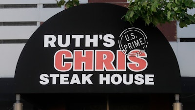 A Ruth's Chris Steak House sign in San Francisco, April 21, 2020.