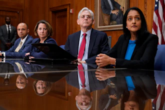 Attorney General Merrick Garland, center, at a news conference about the beleaguered Jackson water system, Washington, Nov. 30, 2022.