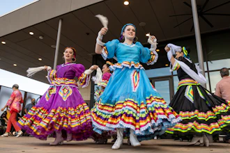 Young Folklorico dancers from the group Viva Mexico begin their dance routine at a Cinco de Mayo celebration hosted by the Odessa Hispanic Chamber of Commerce at the Odessa Marriott Hotel and Convention Center, Wednesday, May 5, 2021, in Odessa, Texas. American bars and restaurants gear up every year for Cinco de Mayo, offering special deals on Mexican food and alcoholic drinks for the May 5 holiday that is barely celebrated south of the border.