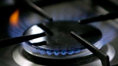 A gas-lit flame burns on a natural gas stove, Jan. 11, 2006, in Stuttgart, Germany.