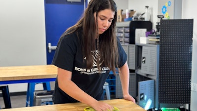 Addison Beer, 17, prepares for summer campers at the Virginia G. Piper branch of the Boys & Girls Club, Scottsdale, Ariz., May, 25, 2023.