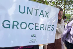 Proponents of removing a tax on groceries hold a rally outside the statehouse in Montgomery, Ala., April 11, 2023.
