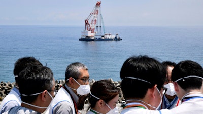 A work ship seen during a media tour of the Fukushima Daiichi nuclear power plant, Fukushima, Japan, June 26, 2023.