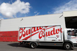 A truck drives past cases of beer at the Budejovicky Budvar brewery in Ceske Budejovice, Czech Republic, March 11, 2019.