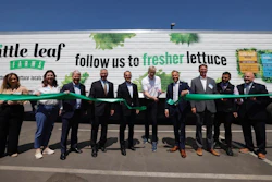 Pennsylvania Gov. Josh Shapiro, center left, and other state officials welcome Little Leaf Farms’ leadership, including founder and CEO Paul Sellew, center right, at a ribbon cutting in McAdoo, Pa.