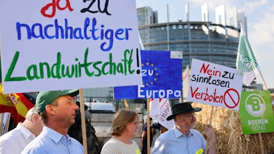 German farmers supporting the EU's Green Deal bill demonstrate outside the European Parliament, Strasbourg, July 11, 2023.