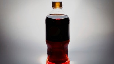 A bottle of soda is photographed in Washington, Jan. 23, 2014.