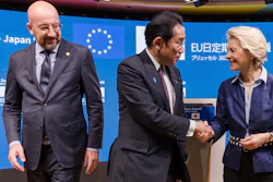 Japan Prime Minister Fumio Kishida, center, walks with European Council President Charles Michel, left, as he shakes hands with European Commission President Ursula von der Leyen, Brussels, July 13, 2023.
