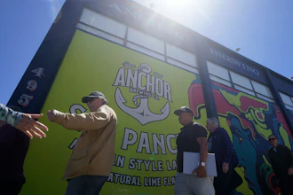 People in line outside Anchor Public Taps in San Francisco, July 13, 2023.