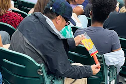 Footage captured by 'New York Nico' of a fan using a hot dog as a straw, Yankee Stadium, New York, Aug. 22, 2022.