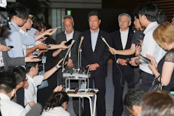 Masanobu Sakamoto, head of the National Federation of Fisheries Cooperative Associations, at a press conference in Tokyo, Aug. 21, 2023.