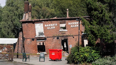The burnt remains of the Crooked House pub, Himley, England, Aug. 7, 2023.