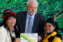 Brazil President Luiz Inacio Lula da Silva, center, Joenia Wapichana, president of the National Indigenous Foundation, left, and Minister of Indigenous Peoples Sonia Guajajara, during a ceremony in Brasilia, Sept. 5, 2023.