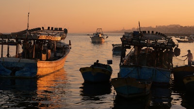 Palestinian fishing boats return to port in Gaza City, Sept. 7, 2023.