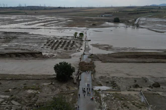 Floodwaters and mud cover land after a record rainstorm, Nea Lefki, Greece, Sept. 6, 2023.