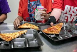 Students select their meals during the lunch break at an elementary school in Scottsdale, Ariz., Dec. 12, 2022.