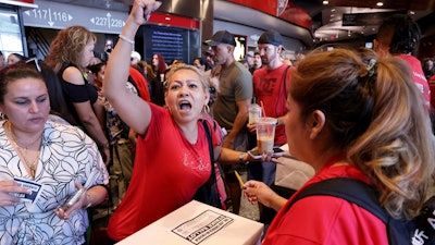 Culinary Union members, including Veronica Flores Serrano, who works at The Linq, cast ballots during a strike vote at the Thomas & Mack Center, Las Vegas, Sept. 26, 2023.