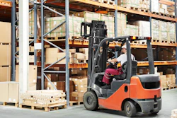 Worker Driver At Warehouse Forklift Loader Works 121681970 4043x2646 (1)