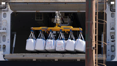The Norwegian Aker BioMarine's Antarctic Provider unloads large sacks of krill, now labelled 'product of Norway' at a port in Montevideo, Uruguay, on Feb. 21, 2023.