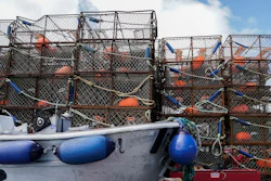 Crab pots sit on a dock in Kodiak, Alaska, June 25, 2023.