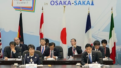 Japanese Foreign Minister Yoko Kamikawa, left, and Yasutoshi Nishimura, right, the minister in charge of trade, at a G-7 Trade Ministers' Meeting in Osaka, Oct. 29, 2023.