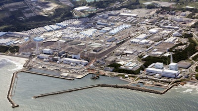 This aerial view shows the Fukushima Daiichi nuclear power plant in Fukushima, northern Japan, on Aug. 24, 2023, shortly after its operator Tokyo Electric Power Company Holdings TEPCO began releasing its first batch of treated radioactive water into the Pacific Ocean. Japan's wrecked Fukushima nuclear power plant said it began releasing a second batch of treated radioactive wastewater into the sea on Thursday, Oct 5, 2023, after the first round of discharges ended smoothly.