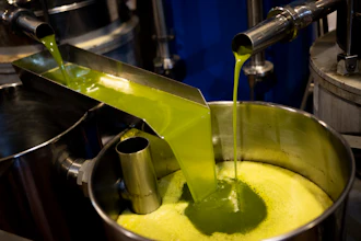 A tank is filled with olive oil at the 'La Betica Aceitera' oil mill, Quesada, Spain, Oct. 27, 2022.