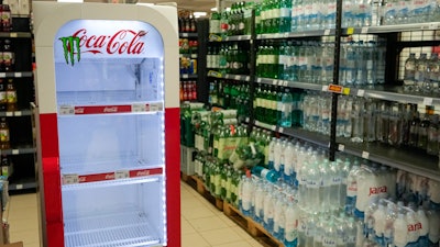 An empty Coca-Cola refrigerator at a shop in Zagreb, Croatia, Nov. 8, 2023.