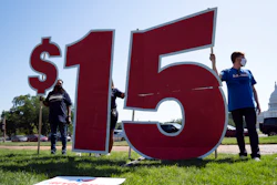 Demonstrators gather in support of McDonald's workers on strike to be paid $15 per hour in Washington on May 19, 2021.