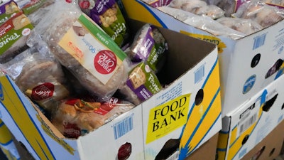 Recovered food is prepared to be distributed at a mobile food bank at Feeding Westchester, Elmsford, N.Y., Nov. 15, 2023.