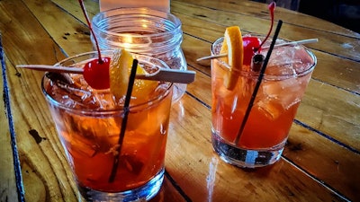 Two old fashioned cocktails at a restaurant in Fitchburg, Wis.