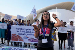Activists demonstrate at the COP28 U.N. Climate Summit in Dubai, Dec. 6, 2023.