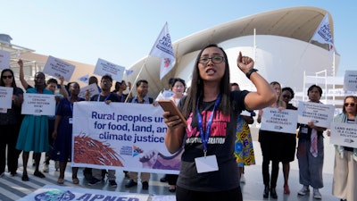 Activists demonstrate at the COP28 U.N. Climate Summit in Dubai, Dec. 6, 2023.