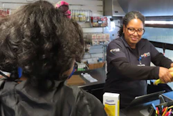 Cashier Denise Padilla rings up groceries on a mobile supermarket in Atlantic City N.J., Dec. 8, 2023.