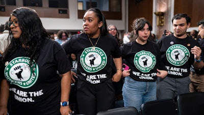 Advocates for a Starbucks employees union at a hearing at the Capitol in Washington, March 29, 2023.