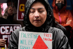 People participate in a sit-in demanding a cease-fire in the Israel-Hamas war, De Longpre Park, Los Angeles, Nov. 15, 2023.