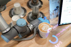 The Artly barista robot serves a drink during the CES tech show, Las Vegas, Jan. 10, 2024.